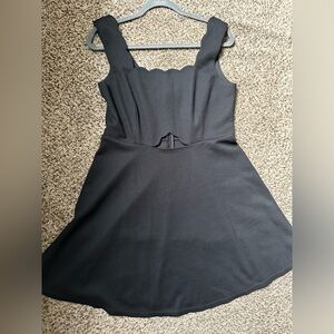 Black mini dress, skater style, with keyhole under bust, size large